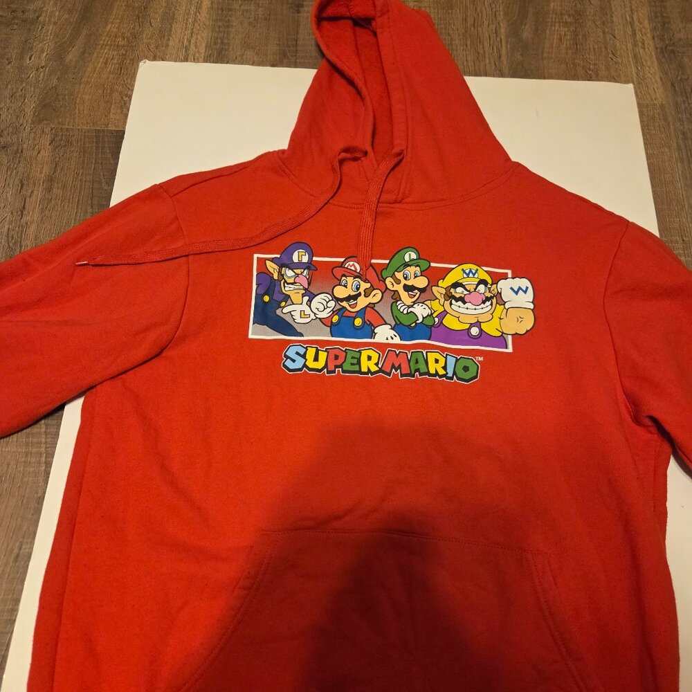 Super Mario Red Graphic Unisex Hoodie featuring Mario, Luigi, Wario, and Waluigi